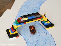 colorful lego bridge over water that was drawn with colored pencil