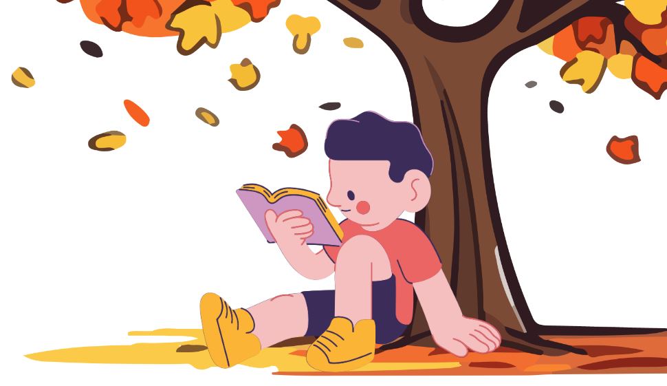 Boy reading under tree