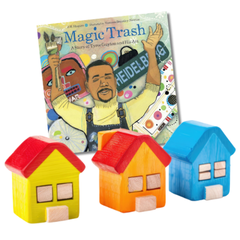 Book cover "Magic Trash" with images of 3 wooden painted houses