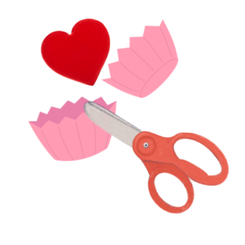 2 cupcake liners, a heart and a pair of scissors