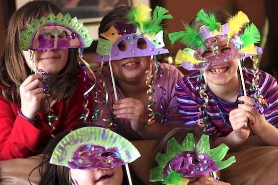 Children in Mardi Gras masks 