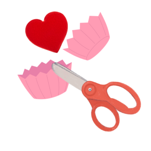 2 cupcake liners, a heart and a pair of scissors