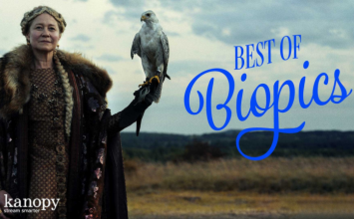 Best of Biopics on Kanopy. Still from the movie Margrete: Queen of the North of Margrete standing in a field with a hawk perched on her hand;
